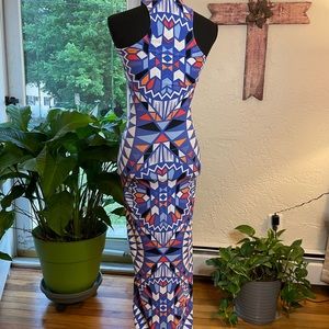 Worn once. Size XS. Two identical dresses but different colors. Great condition